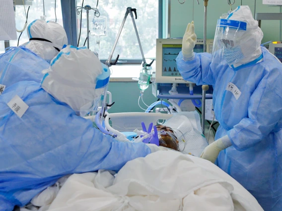 COVID patient being attended to in hospital