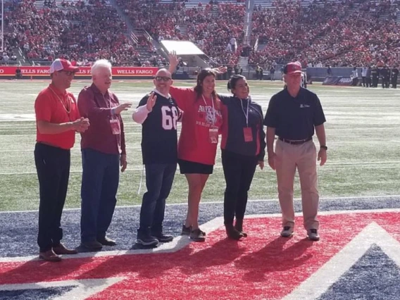 group picture on bear down football field