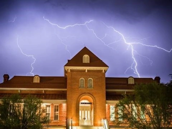 Old Main in a lightning storm