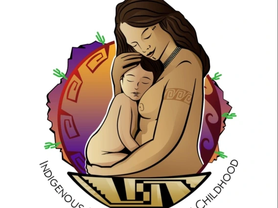 indigenous mother cradling an infant