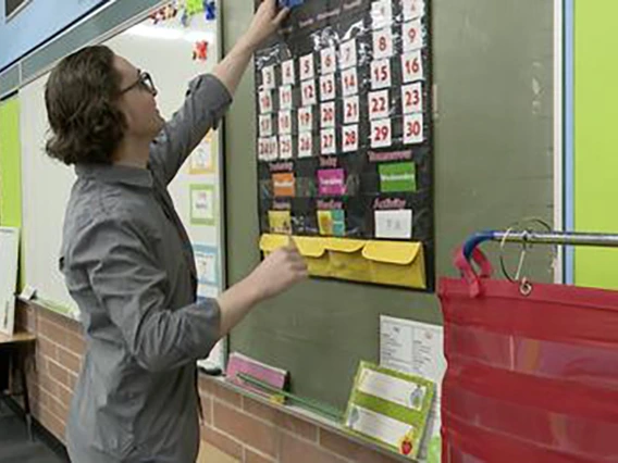 mark anthony ferguson in the classroom at the chalkboard