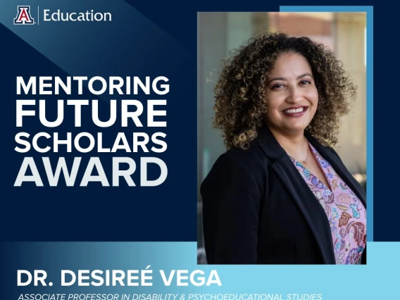 Dr. Desireé Vega, Associate Professor in Disability & Psychoeducational Studies, smiles confidently while being recognized with the Mentoring Future Scholars Award by the University of Arizona College of Education.