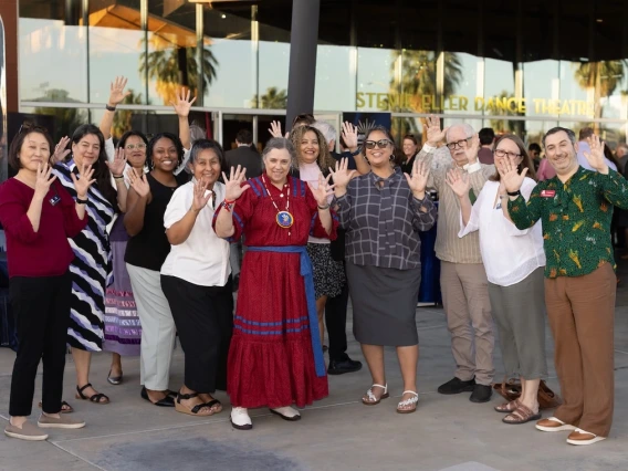 College of Education Faculty at the 2025 Luminaries Awards standing together in a group smiling outside of the Stevie Eller Dance Theatre