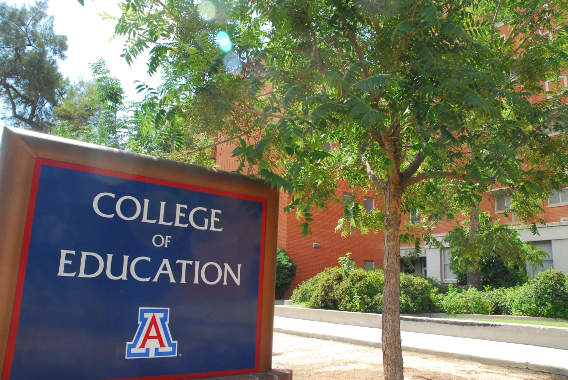 a_college sign and building_photoshopped.jpg college of education sign