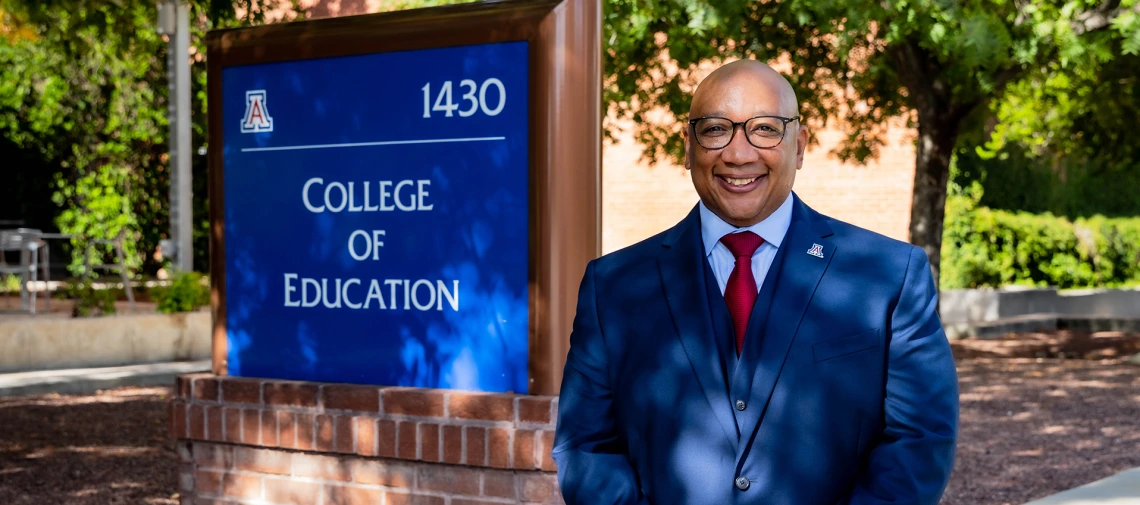 dean berry in front of the education building