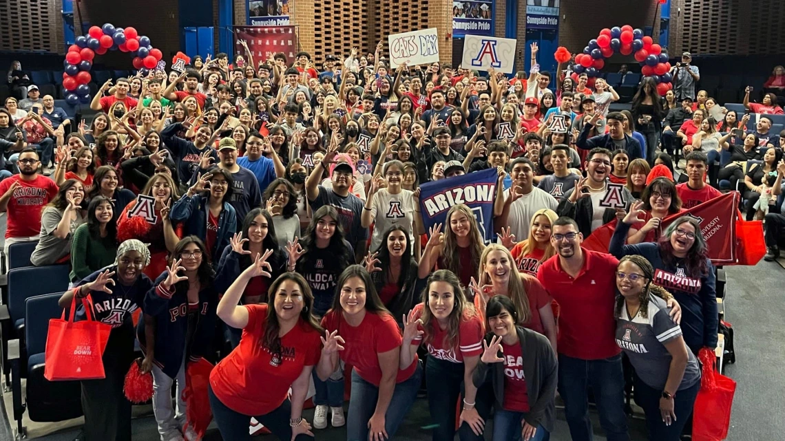 sunnyside student success.jpg large group of high school students celebrating being admitted to UA