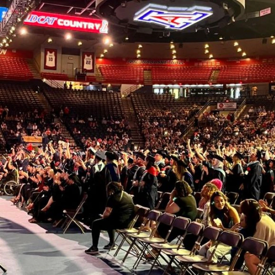 auditorium full of graduates