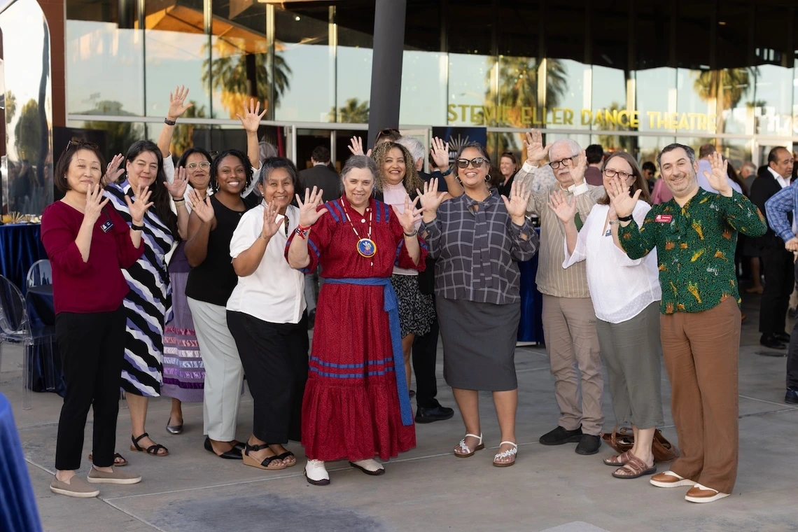 College of Education Faculty at the 2025 Luminaries Awards standing together in a group smiling outside of the Stevie Eller Dance Theatre