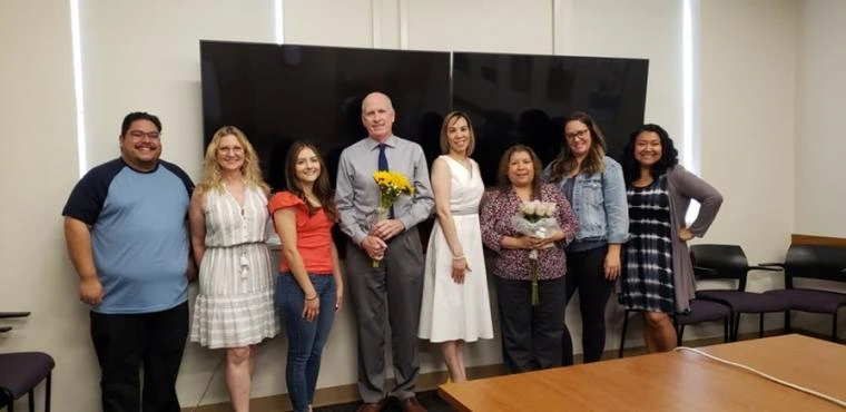 dgab group photo with former dean johnson in conference room