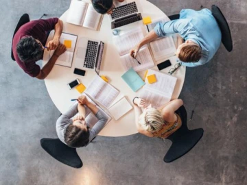 aerial view of adult students at table