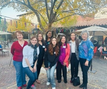 group photo under a palo verde tree